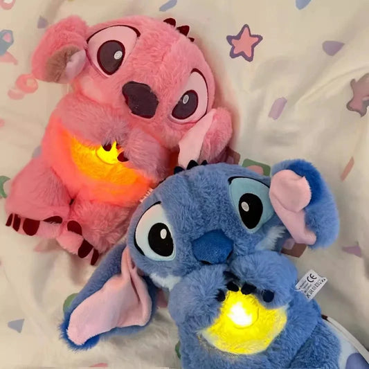 Lilo and Stitch plush sleep buddy featuring cozy blue and pink plush characters holding glowing yellow heart lights