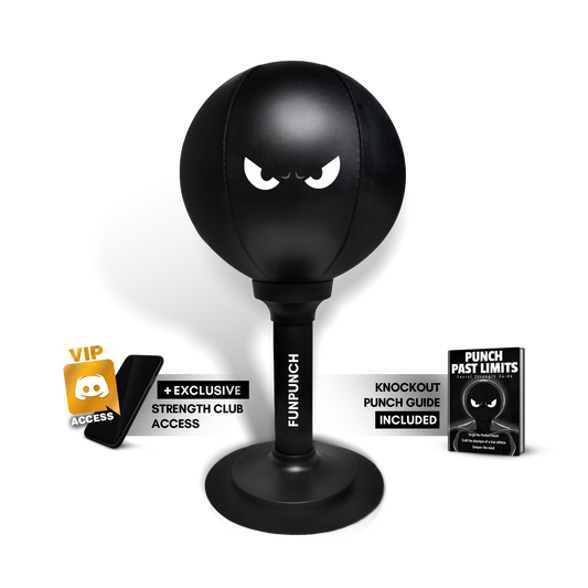 Black desktop punching bag with angry eyes design and sturdy base by LIVSY for stress relief and fitness