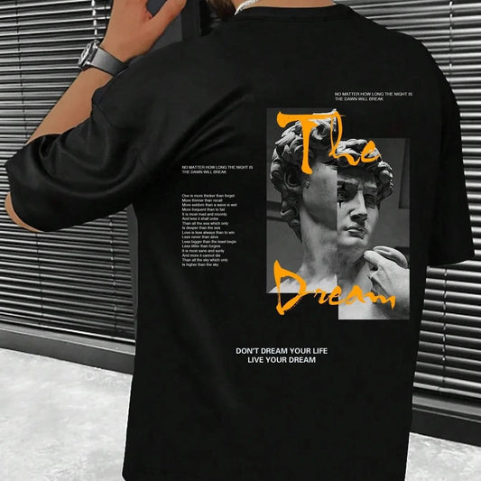 Men's streetwear graphic tee in black with artistic statue print and motivational text on the back