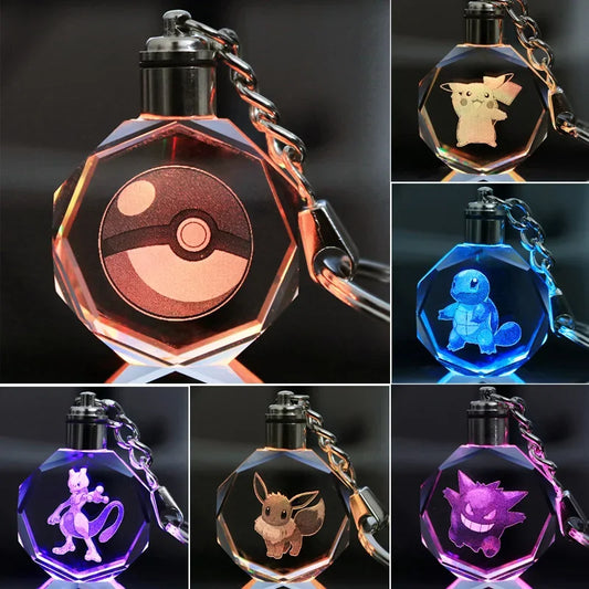 LIVSY Pokemon crystal keychain set featuring Pokeball Pikachu Squirtle Mewtwo Eevee and Gengar glowing in different colors