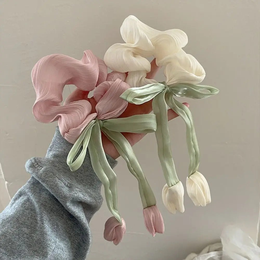 LIVSY Korean style satin scrunchies in pastel pink and cream with green ribbon and tulip accents
