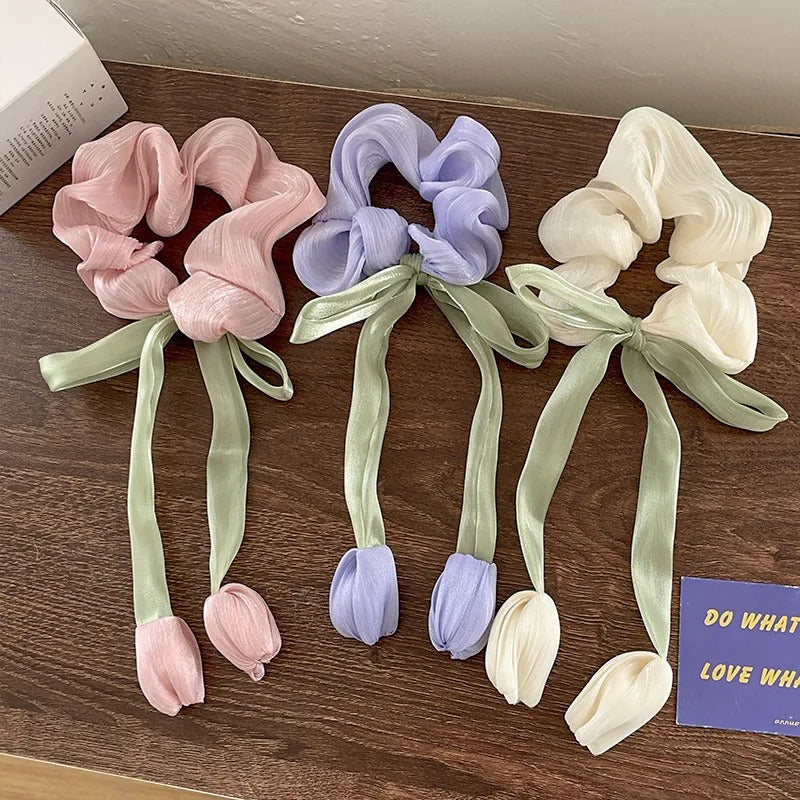 LIVSY Korean style satin scrunchies in pink lavender and cream with green ribbon and tulip accents